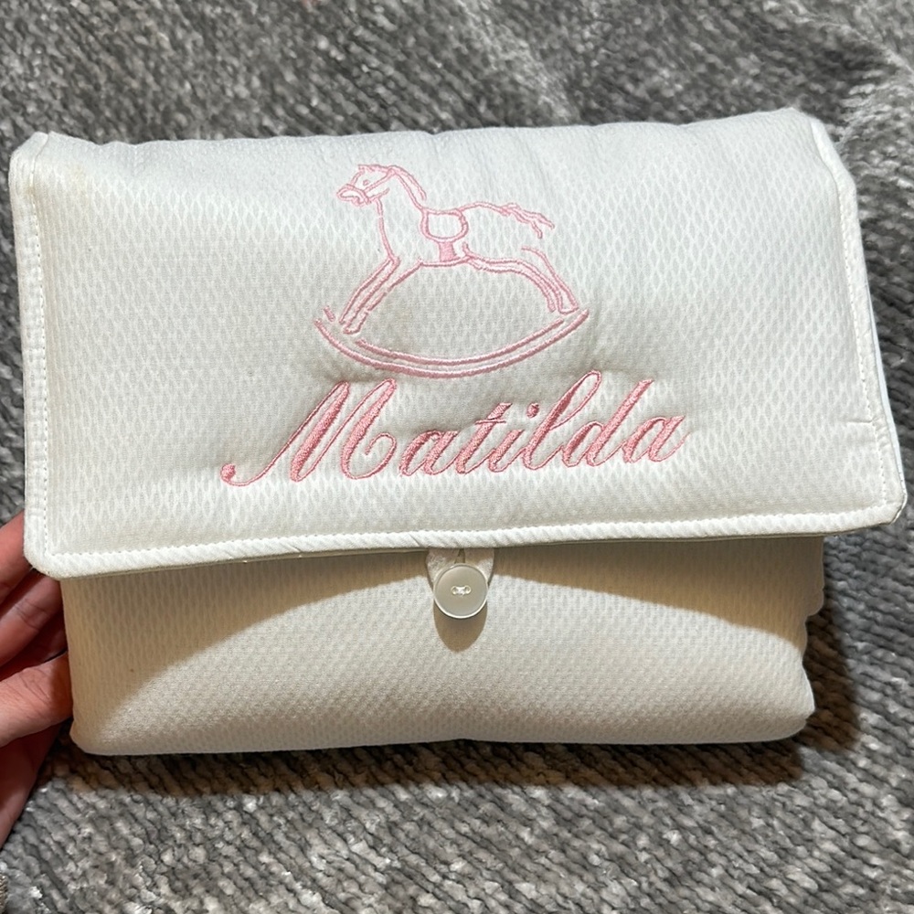 Brand new Peacock Alley custom embroidered Matilda travel changing pad